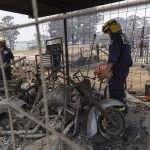 20851828-7674979-Fire_Fighters_inspect_burnt_vintage_motor_bikes_in_Torrington_on-a-26_1573525184041