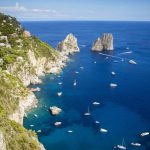 Faraglioni rocks and Capri island, Italy