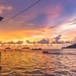 black-torch-lamp-near-body-of-water-1050597